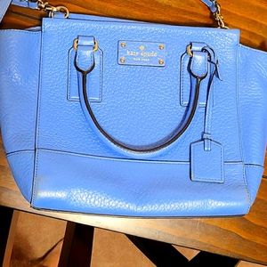 Kate Spade satchel with matching wallet.